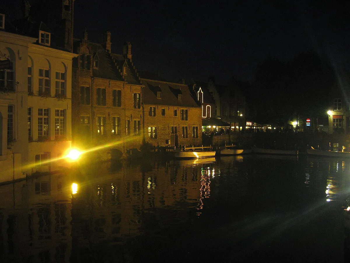 Illuminated streets and landmarks in Bruges at night, Belgium — 1